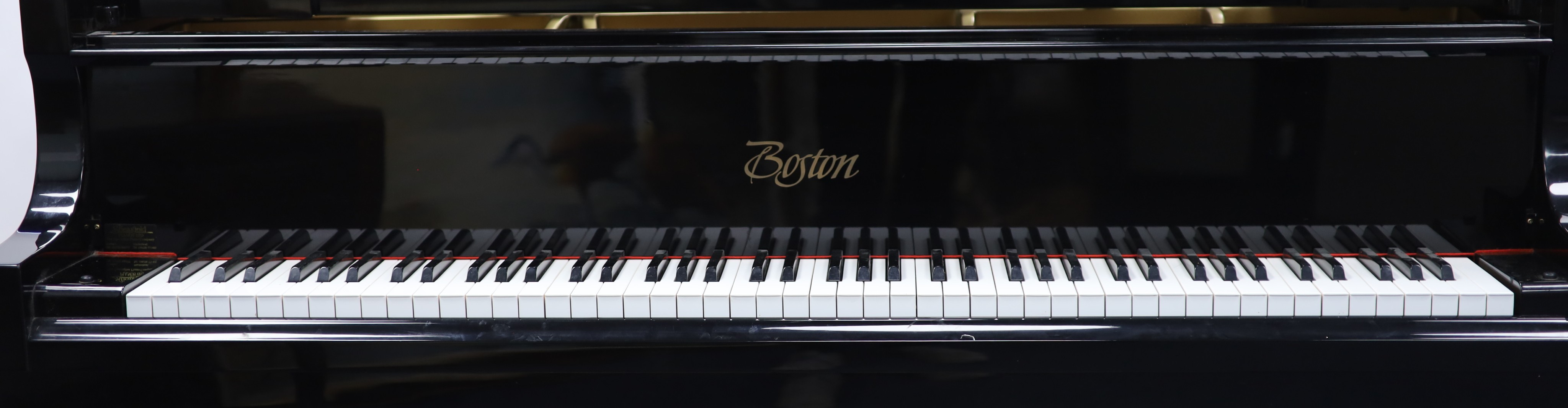 A Steinway & Sons Boston 156 ebonised boudoir grand piano H 102cm. W 146cm. D 150cm.